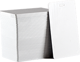 CardPrinting.com photo of a stack of blank white PVC cards with a slot punch on the short side that may be used for vertical ID badges