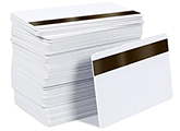 CardPrinting.com photo of a stack of blank white PVC cards with a slot punch on the short side that may be used for vertical ID badges