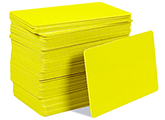 CardPrinting.com photo of a stack of blank yellow PVC cards